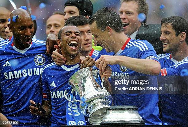 Chelsea's Ashley Cole and John Terry celebrate with the FA Cup after beating Portsmouth 1-0 during the FA Cup Final football match at Wembley, in...