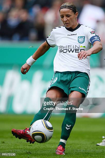 Inka Grings of Duisburg kicks the ball during the DFB Women's Cup final match between FCR 2001 Duisburg and FF USV Jena at RheinEnergie stadium on...