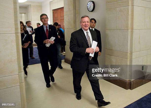 Sen. Richard Durbin, D-Ill., followed by Rep. Brad Miller, D-N.C., walk through the hallways in the Capitol Visitors Center leading to one of the...