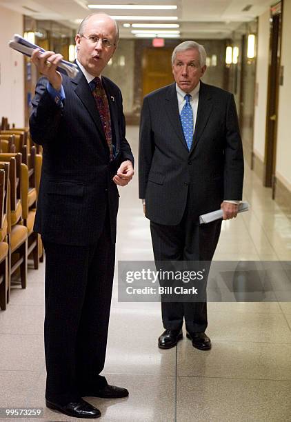 From left, Dave Walker, Former US Comptroller General and CEO & President of the Peter G. Peterson Foundation, and Rep. Frank R. Wolf, R-Va., talk in...