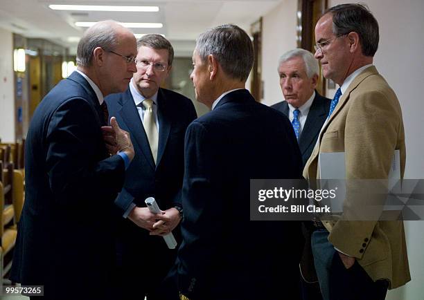 From left, Dave Walker, Former US Comptroller General and CEO & President of the Peter G. Peterson Foundation, Sen. Kent Conrad, D-N.Dak., Sen....