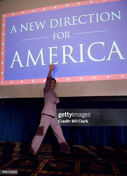 House Minority Leader Nancy Pelosi, D-Calif., approaches the stage at the DSCC and DCCC Election Night Watch Party at the Hyatt Regency Hotell on...