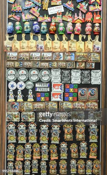 hundreds of souvenir magnets in for sale in downtown prague, bohemia, czech republic - horloge stock-fotos und bilder