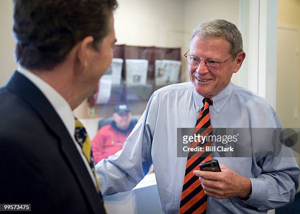 From left, Sen. Jim DeMint, R-S.C., and Sen. James Inhofe, R-Okla., talk before for their news conference in the Senate Radio-TV Gallery studio on...