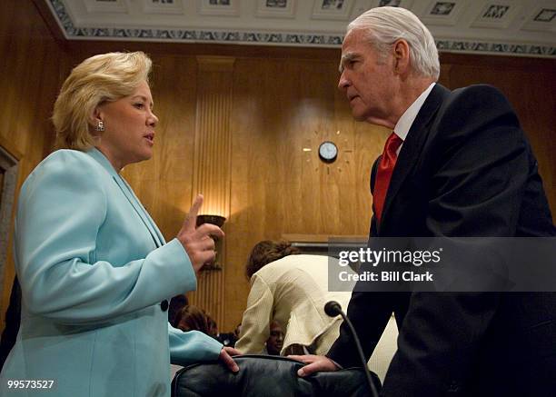 Sen. Mary Landrieu, D-La., speaks with Donald Powell, federal coordinator for Gulf Coast Rebuilding, before the start of the Senate Homeland Security...