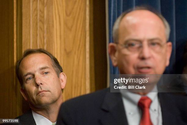 William O'Reilly, Majority Council for the House Ethics Committee, left, looks on as committee chairman Doc Hastings, R-Wash., holds a news...