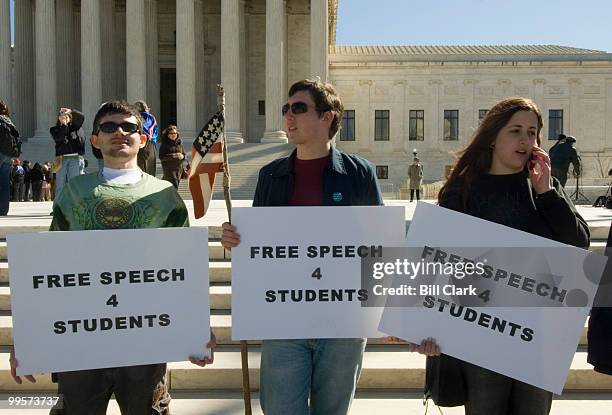 From left, Kevin Newcomb, a high school student from Bethesda, Md., Jay Hartman, University of Maryland student from Adelphi, Md., hold "Free Speech...