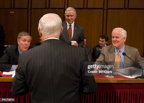 From left, Lindsey Graham, R-S.C., Defense Secretary Robert Gates, Sen. Jeff Sessions, R-Ala., and Sen. Jon Cornyn, R-Texas, talk before the start of...