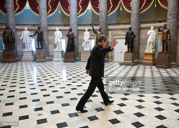 Sen. Tom Coburn, R-Okla., walks through Statuary Hall as he leaves the Congressional Republicans' bicameral healthcare reform strategy session on the...