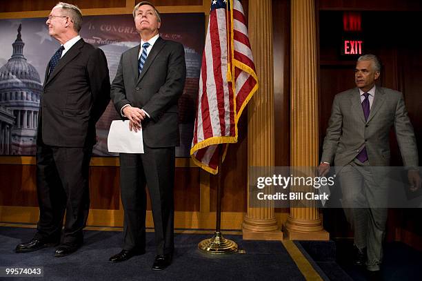 From left, Senate Republican Conference Chairman Lamar Alexander, R-Tenn., Sen. Lindsey Graham, R-S.C., and Sen. John Ensign, R-Nev., participate in...