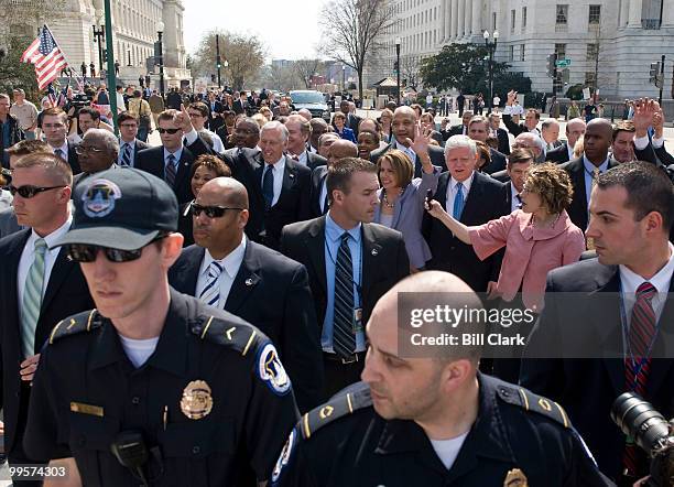 From left, House Majority Leader Steny Hoyer, D-Md., Rep. John Lewis, D-Ga., Speaker of the House Nancy Pelosi, D-Calif., and Rep. John Larson,...