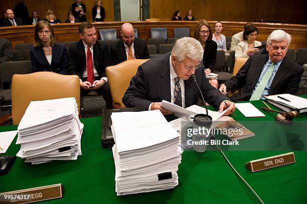 Sen. Michael Enzi, R-Wyo., left, and chairman Chris Dodd, D-Conn., wait for other Senators to arrive before the start of the Senate Health,...