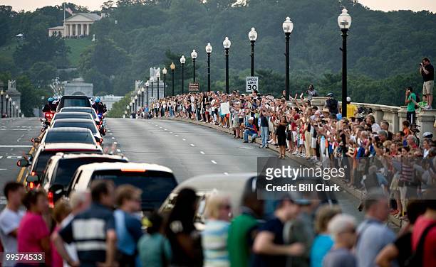 Sen. Edward Kennedy's funeral procession travels over Memorial Bridge from the Lincoln Memorial to Arlington National Cemetery, where the Senator...
