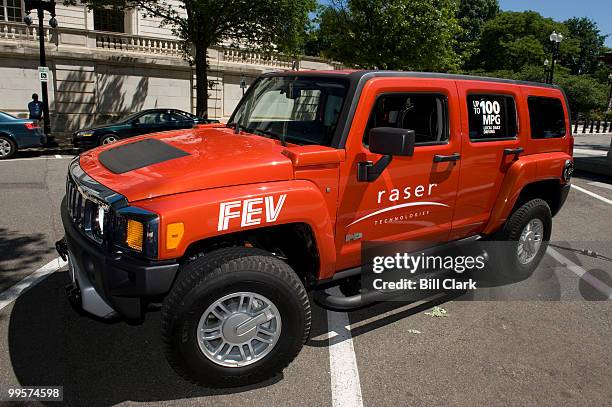The Raser Technologies 100 mgp Electric Hummer H3 sits on display next to the Russell Senate Office Building on Wednesday, May 20, 2009.