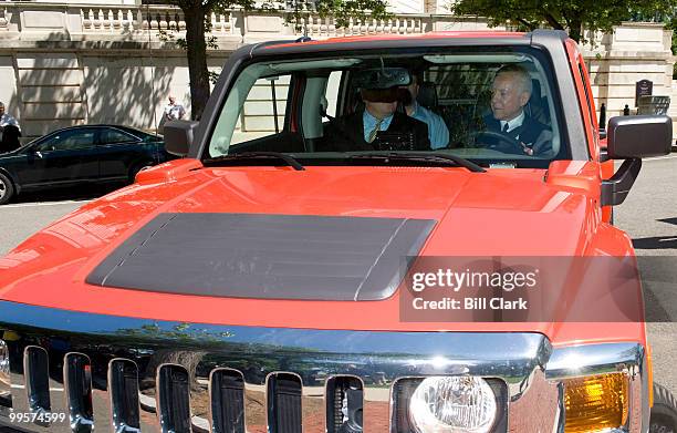 Sen. Orrin Hatch, R-Utah, test drives the Raser Technologies 100 mgp Electric Hummer H3 next to the Russell Senate Office Building on Wednesday, May...