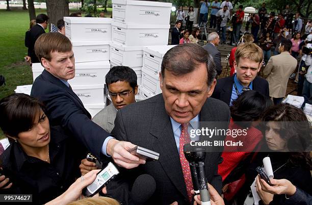 Sen. Mel Martinez, R-Fla., speaks to reporters as he leaves the immigration news conference on Capitol Hill with Univision radio personality Eddie...