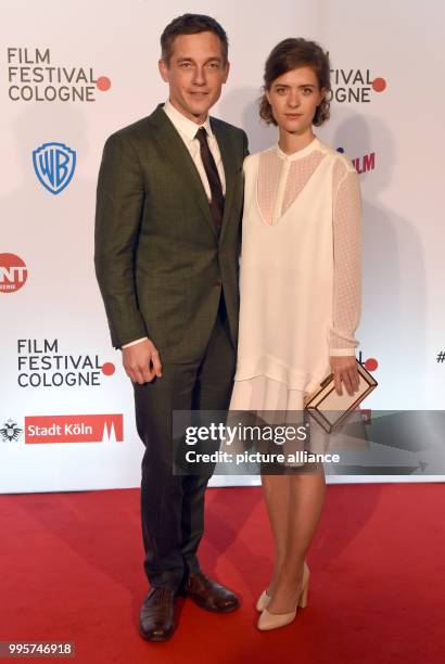 Actors Volker Bruch and Liv Lisa Fries arrive for the presentation of their series Babylon Berlin as part of Film Festival Cologne in Cologne,...