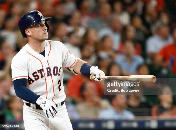 Alex Bregman of the Houston Astros hits a home run in the first inning against the Oakland Athletics at Minute Maid Park on July 10, 2018 in Houston,...