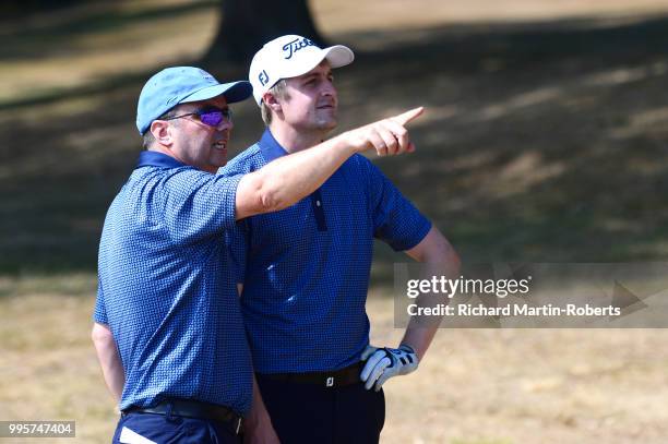 Alex Rowland makes a point to Amateur Alec Thomas of Hawarden Golf Club during the Lombard Trophy North of England Qualifier at Sandiway Golf Club on...