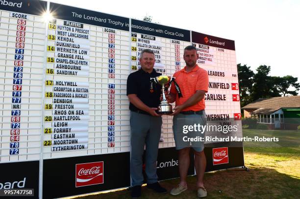 David Green and Amateur Andy Nolan of Dukinfield Golf Club pose with the trophy after scoring the lowest round during the Lombard Trophy North of...