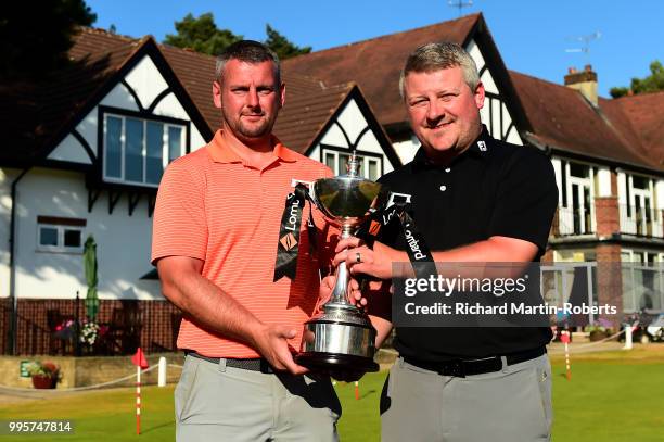David Green and Amateur Andy Nolan of Dukinfield Golf Club pose with the trophy after scoring the lowest round during the Lombard Trophy North of...