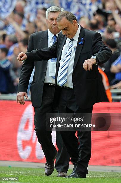 Chelsea manager Carlo Ancelotti prepares to shake hands with Portsmouth manager Avram Grant after Chelsea beat Portsmouth 1-0 during the FA Cup Final...