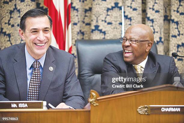 Ranking member Darrell Issa, R-Calif., and chairman Edolphus Towns, D-N.Y., joke with photographers before the start of the House Oversight and...