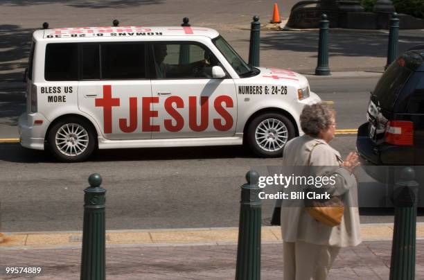 Jesus SUV drives down Independence, Ave SW in front of the Rayburn House Office Building on Wednesday, July 18, 2007.