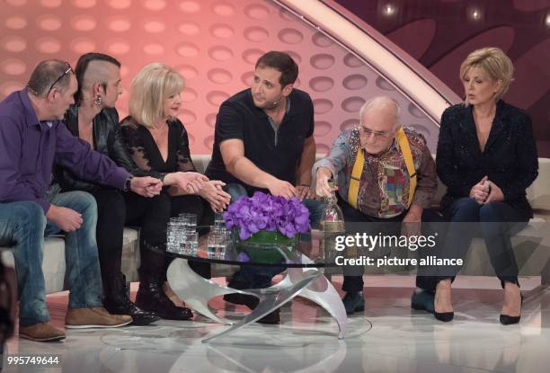 Presenter Carmen Nebel and people from the ZDF show "Bares fuer Rares" on stage during the ZDF TV show "Willkommen bei Carmen Nebel" at the TUI-Arena...