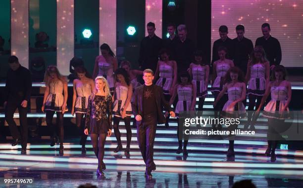 Irish dance group Riverdance on stage during the ZDF TV show "Willkommen bei Carmen Nebel" at the TUI-Arena in Hanover, Germany, 30 September 2017....