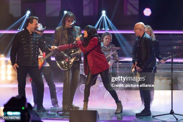 Singer Nena and "rock legends" on stage during the ZDF TV show "Willkommen bei Carmen Nebel" at the TUI-Arena in Hanover, Germany, 30 September 2017....