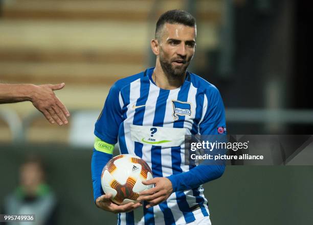 Hertha's Vedad Ibisevic holding the ball during the Europa League soccer match between Oestersunds FK vs Hertha BSC in the Jaemtkraft stadium in...