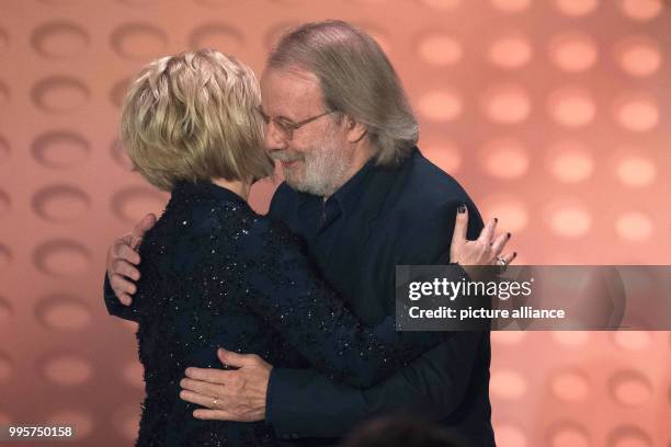 Swedish musician Benny Anderson and presenter Carmen Nebel on stage during the ZDF TV show "Willkommen bei Carmen Nebel" at the TUI-Arena in Hanover,...