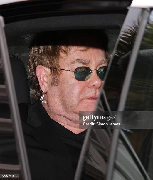 Sir Elton John leaves his hotel on May 15, 2010 in Cannes, France.