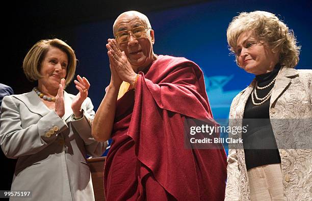 From left, Speaker of the House Nancy Pelosi, D-Calif., His Holiness The Dalai Lama, and Annette Lantos, widow of Rep. Tom Lantos, participate in the...