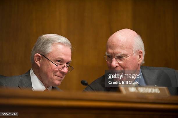 Sen. Jeff Sessions, R-Ala., left, and chairman Patrick Leahy, D-Vt., participate in the Senate Judiciary Committee hearing on the Violence Against...