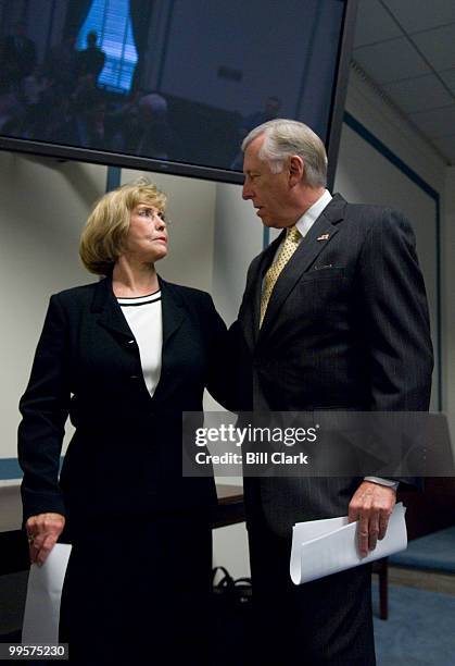 Lilly Ledbetter speaks with House Majority Leader Steny Hoyer, D-Md., before the start of the news conference on Tuesday, June 12 to announce...