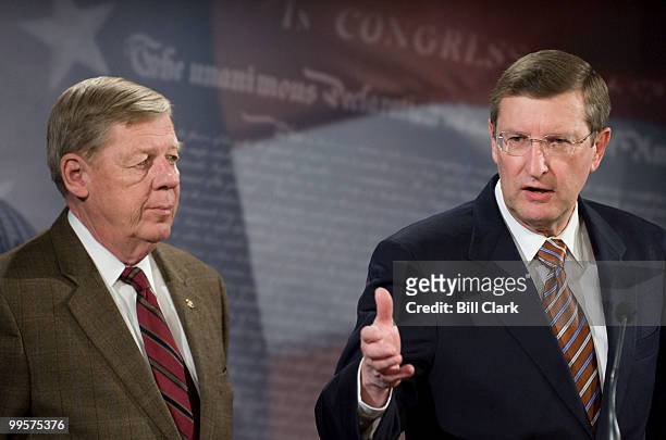 Sen. Johnny Isakson, R-Ga., left, and Sen. Kent Conrad, D-N. Dak., hold a news conference to introduce the Financial Markets Commission Act of 2009...