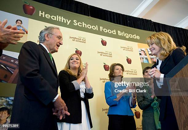 From left, Senate Agriculture Chairman Tom Harkin, D-Iowa, is introduced as the first speaker as actress Andrea Bowen, Sen. Lisa Murkowski, R-Alaska,...