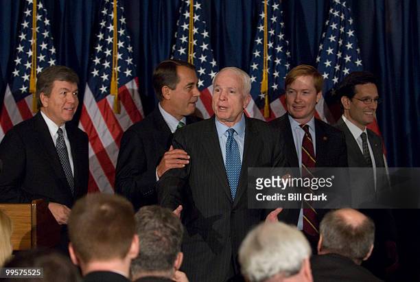 Republican Presidential candidate Sen. John McCain, R-Ariz., center, attends a news conference with Republican House leaders, including orm left,...