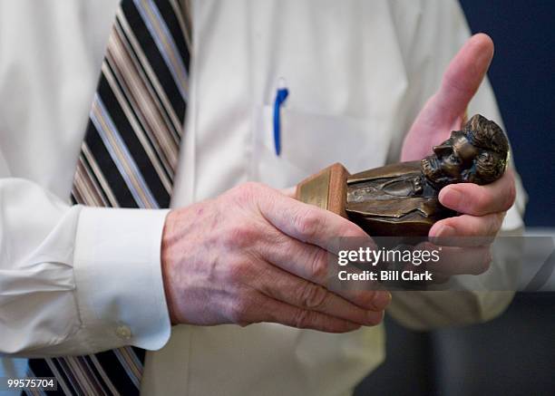 Rep. Joe Pitts, R-Pa., shows off one of his Abraham Lincoln scultupres in his office on Tuesday, June 16, 2009.