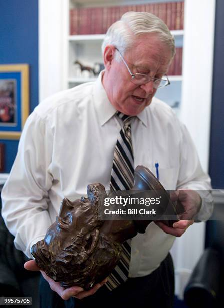 Rep. Joe Pitts, R-Pa., shows off one of his Abraham Lincoln scultupres in his office on Tuesday, June 16, 2009.