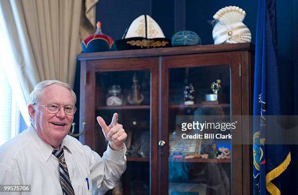 Rep. Joe Pitts, R-Pa., shows off some of the hats he has on display in his office on Tuesday, June 16, 2009.