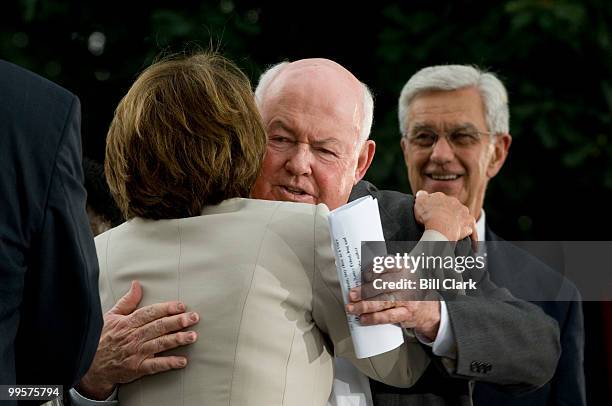 House Speaker Nancy Pelosi, D-Calif., hugs AFL-CIO President John Sweeney, as she arrives for the AFL-CIO Rally celebrating the minimum wage increase...