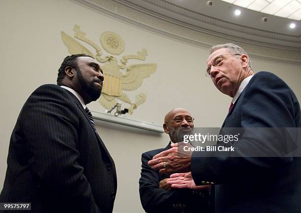 From left, John Boyd Jr., president of the National Black Farmers Association, Lawrence Lucas, president USDA Coalition of Minority Employees, and...