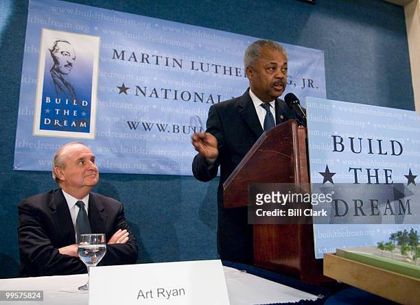 Rep. Donald Payne, D-N.J., speaks as Art Ryan, chairman and CEO of Prudential Financial, looks on during the Martin Luther King, Jr., National...