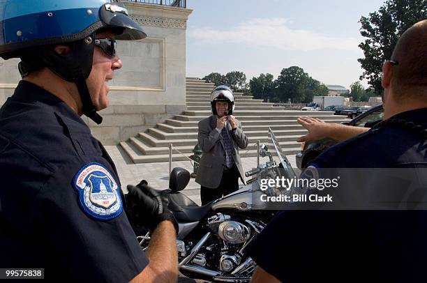 Rep. Tim Walberg, R-Mich., today participated in National Ride to Work Day and rode a Harley Davidson to the east steps of the U.S. Capitol on...