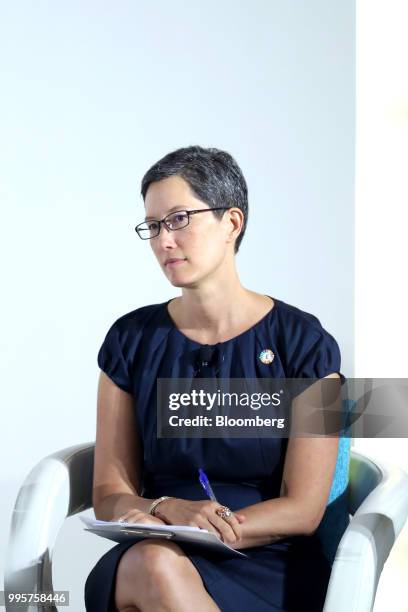 Sulian Tay, managing director of investment at Temasek Holdings Pte., attends a news conference following the company's annual review in Singapore,...