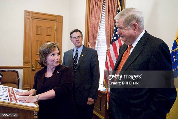 From left, Democratic congressional candidate Linda Stender, Rep. Rush Holt, D-N.J., and Rep. John Murtha, D-Pa., speak during a news conference held...