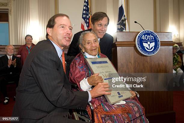 Rep. Tom Udall, D-NM, left, presents storyteller Esther Martinez, of San Juan Pueblo, N.M., with the National Endowment for the Arts' National...